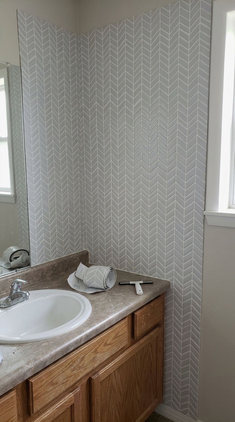 22 Chevron Bathroom Tile Ideas for a Sleek Directional Pattern 21 21. Peel and Stick Chevron Tile Renter Upgrade